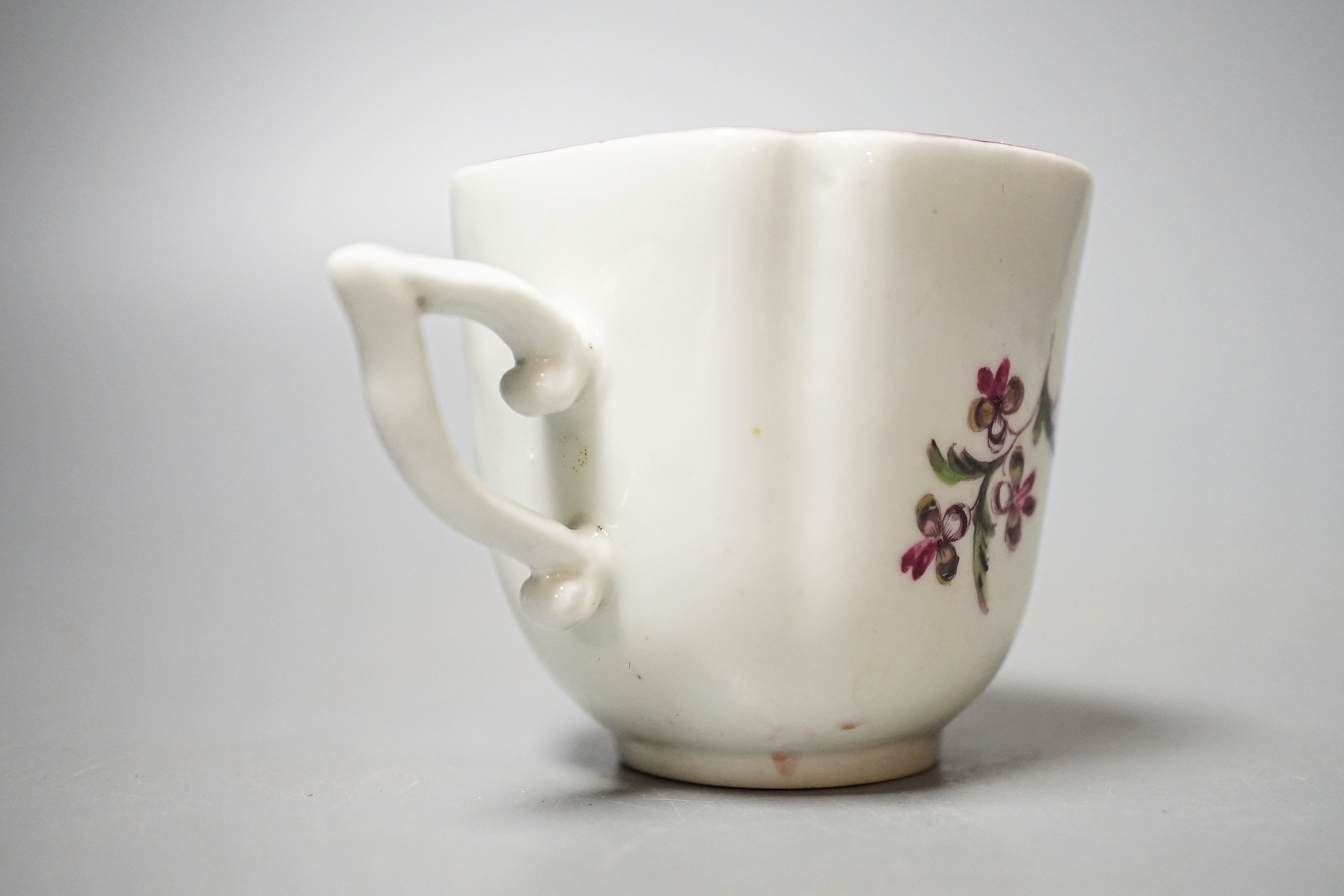 A Derby coffee cup, c.1758, wishbone shaped handle, height 5.7cm